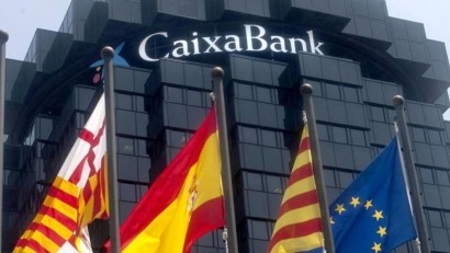 CaixaBank usará solo electricidad de origen renovable en dos años